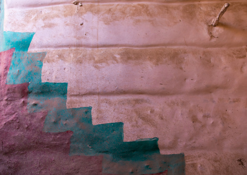Al-qatt al-asiri traditionally female interior stairs decoration in an abandonned house, Asir province, Sarat Abidah, Saudi Arabia