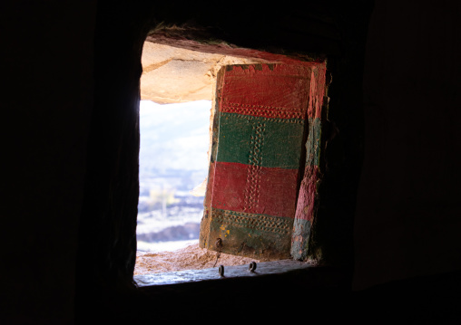 Colorful wooden window of an old asiri house, Asir province, Sarat Abidah, Saudi Arabia