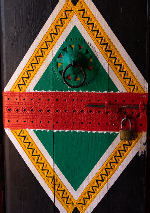 Colorful wooden door of an old asiri house, Asir province, Khamis Mushait, Saudi Arabia