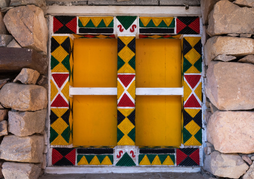 Colorful wooden wondow of an asiri house, Asir province, Khamis Mushait, Saudi Arabia