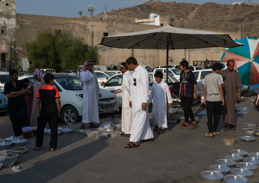 Honey and honeycombs for sale on a market, Asir province, Muhayil, Saudi Arabia