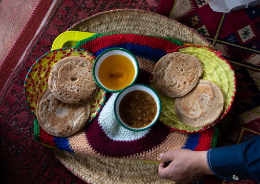 Bread with ghee and honey served to guests in a majlis, Asir province, Tanomah, Saudi Arabia