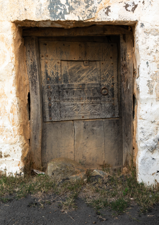 Old wooden door of an abandonned house, Asir province, Al Olyyan, Saudi Arabia