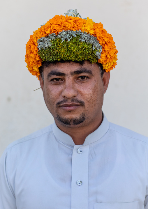 Portrait of a flower man wearing a floral crown on the head, Jizan Province, Addayer, Saudi Arabia