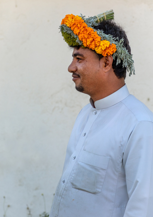 Portrait of a flower man wearing a floral crown on the head, Jizan Province, Addayer, Saudi Arabia