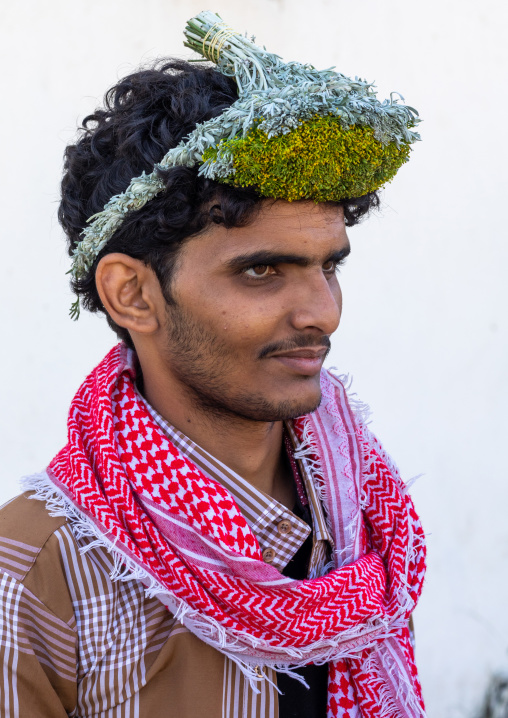 Portrait of a flower man wearing a floral crown on the head, Jizan Province, Addayer, Saudi Arabia