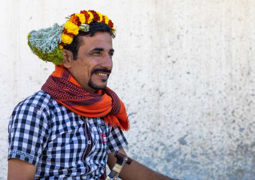 Portrait of a flower man wearing a floral crown on the head, Jizan Province, Addayer, Saudi Arabia