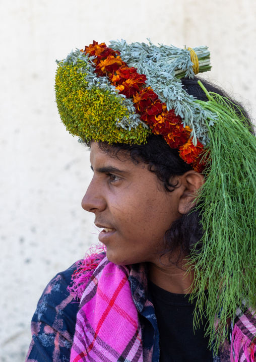 Portrait of a flower man wearing a floral crown on the head, Jizan Province, Addayer, Saudi Arabia