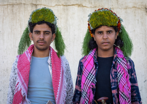 Portrait of flower men wearing floral crowns on the heads, Jizan Province, Addayer, Saudi Arabia