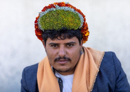 Portrait of a flower man wearing a floral crown on the head, Jizan Province, Addayer, Saudi Arabia