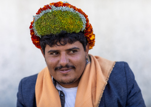 Portrait of a flower man wearing a floral crown on the head, Jizan Province, Addayer, Saudi Arabia
