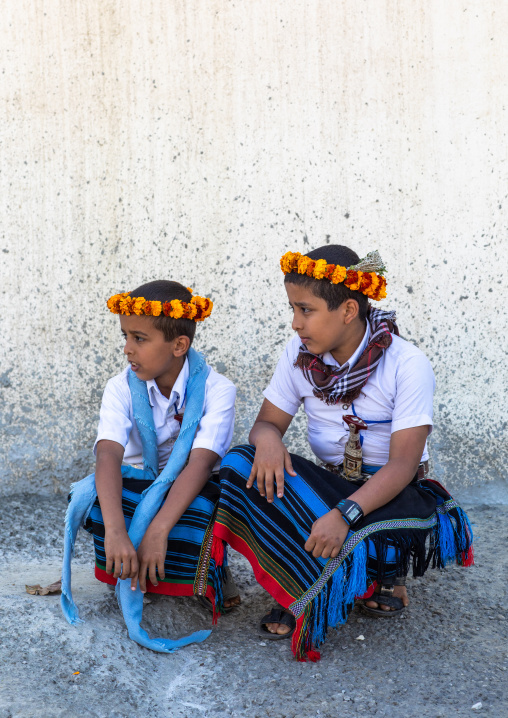 Portrait of flower boys wearing floral crowns on the heads, Jizan Province, Addayer, Saudi Arabia