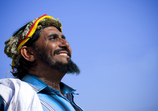 Portrait of a flower man wearing a floral crown on the head, Jizan province, Addayer, Saudi Arabia