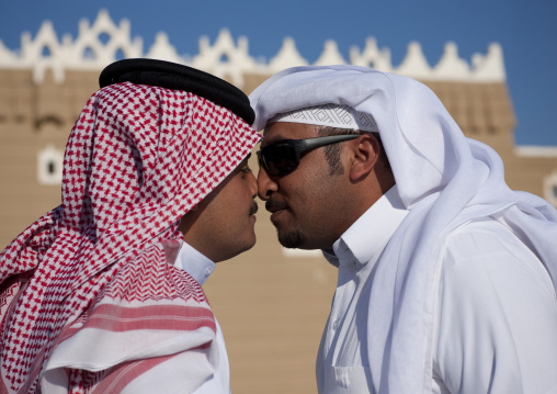 Portrait of saudi men traditionally kissing on the nose, Najran Province, Najran, Saudi Arabia
