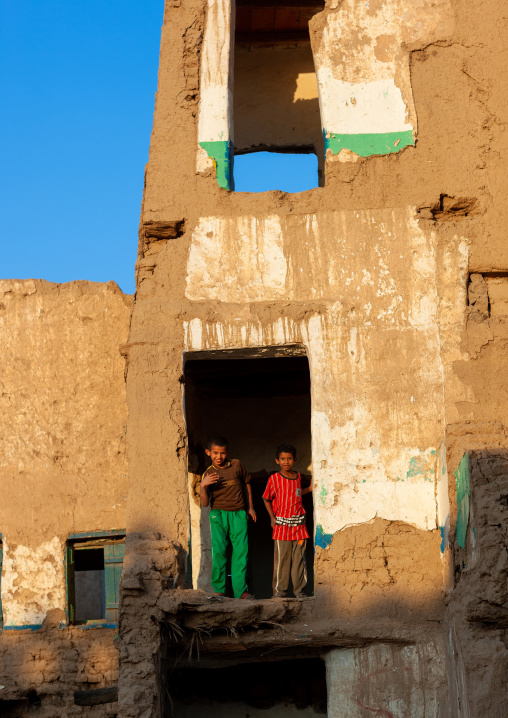 Saudi children in an old house, Najran Province, Najran, Saudi Arabia