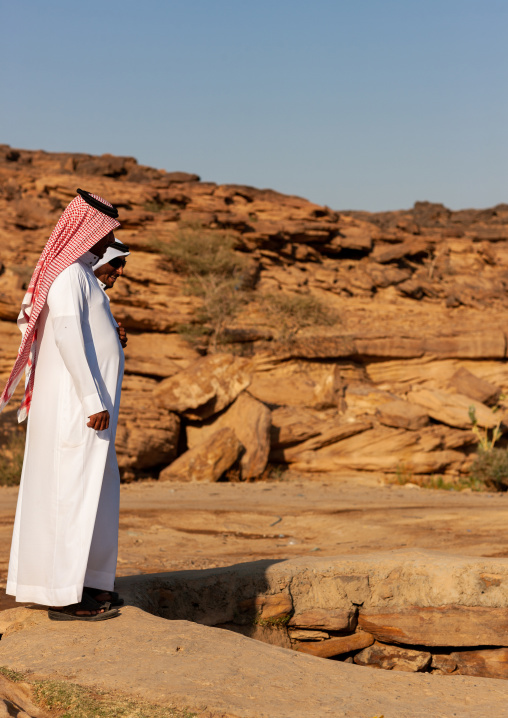 Saudi man in bir hima, Najran Province, Najran, Saudi Arabia