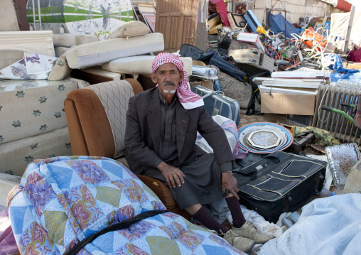 Saudi man selling in a market fea, Najran Province, Najran, Saudi Arabia