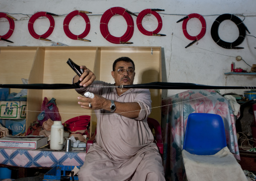 Saudi man making shishas, Mecca province, Jeddah, Saudi Arabia