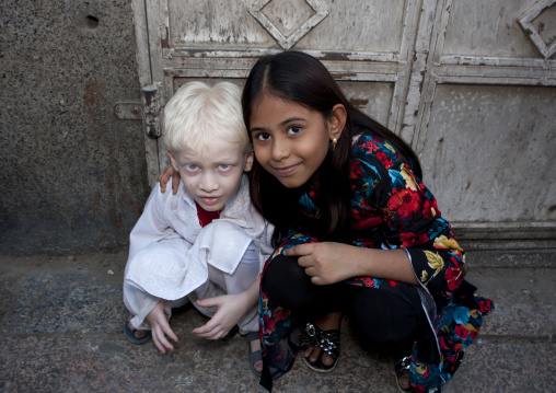 Albino indian boy with a girl, Mecca province, Jeddah, Saudi Arabia