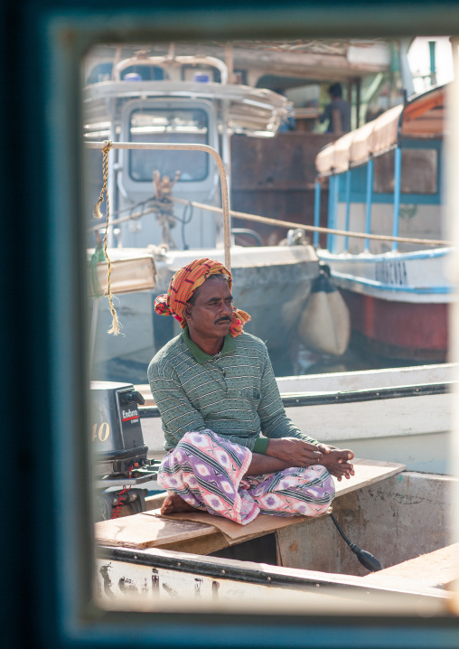 Fisherman on a boat, Jizan Region, Jizan, Saudi Arabia