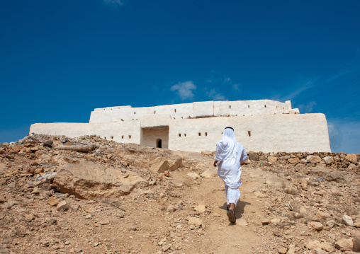 Saudi man in qal at al-atrak the ottoman castle, Jizan Region, Farasan island, Saudi Arabia