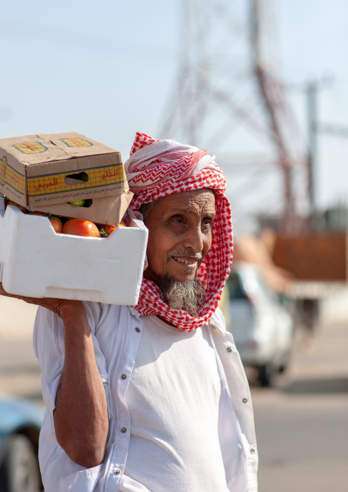 Portrait of a saudi man in a market wearing a kaffiyeh, Jizan Province, Sabya, Saudi Arabia