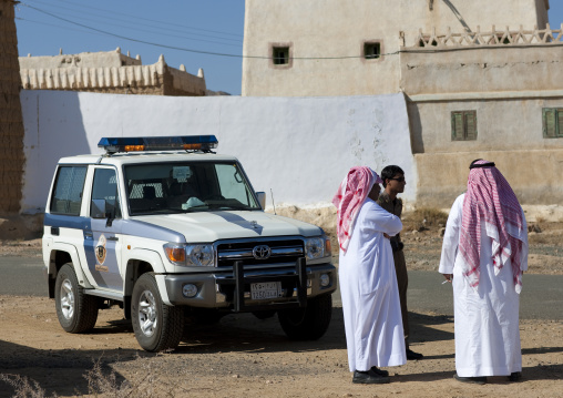 Police escort for tourists in a village, Najran Province, Najran, Saudi Arabia