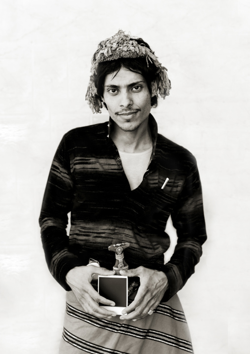 Flower man from asir, Saudi arabia