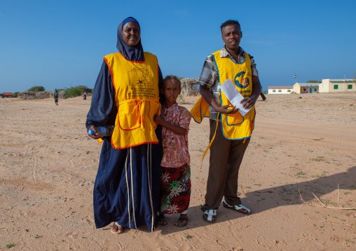 A woman and a man in a campaign for polio vaccination, Awdal region, Lughaya, Somaliland