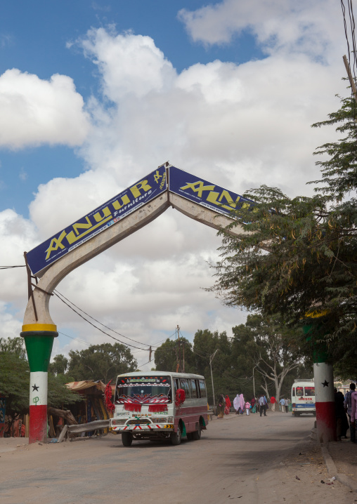 Bus passing below a gate in town, Woqooyi Galbeed region, Hargeisa, Somaliland
