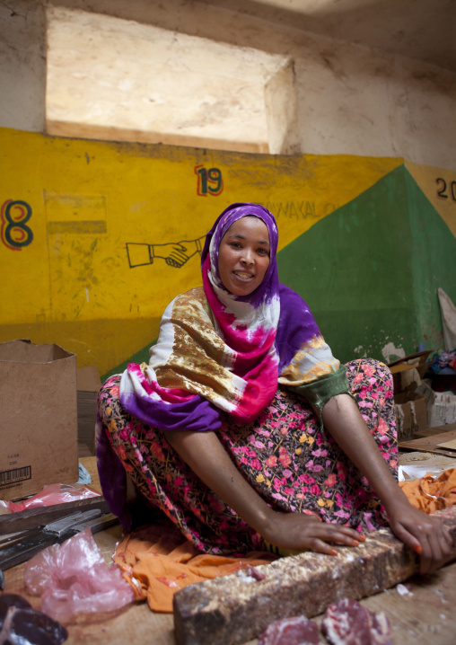 A Woman Sitting On The Floor Selling Meat, Hargeisa Market, Somaliland