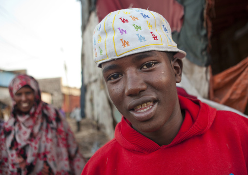 A Teenage Boy Wearing An American Fashion Cap In A Street Of Hargeisa, Somaliland