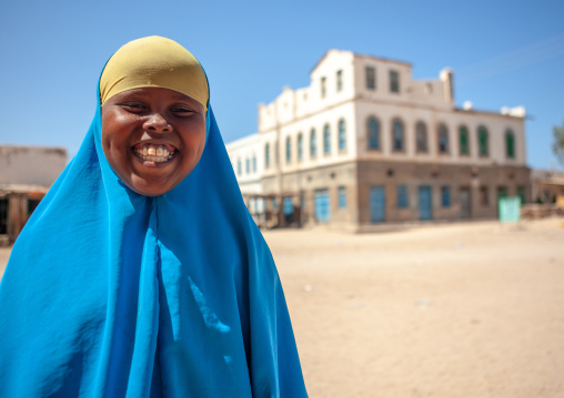 Smiling somali girl  in front of  a former ottoman empire house, North-Western province, Berbera, Somaliland
