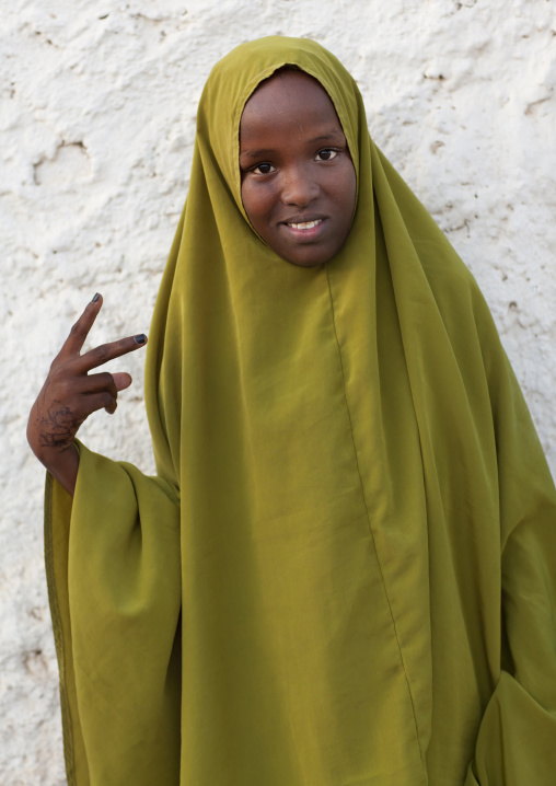 Portrait Of A Teenage Girl In A Khaki Veil Making V Sign, Berbera, Somaliland