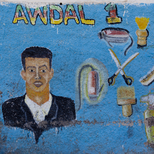 A Painted Advertisment Sign For A Barbershop And Hairdresser Salon Depicting A Man And Barber Tools, Boorama, Somaliland