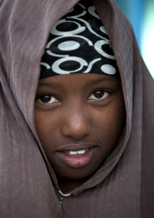 Portrait Of A Timid Smiling Young Girl Wearing A  Brown Veil, Boorama, Somaliland