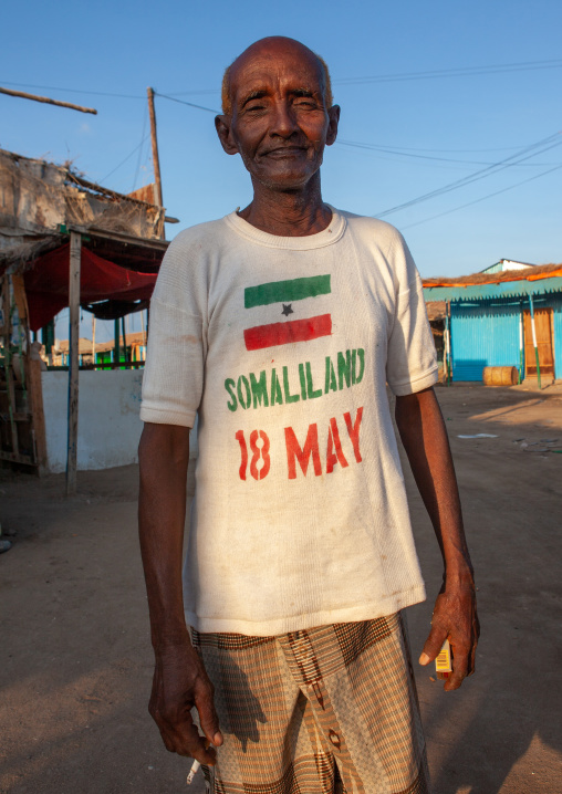 Old somali man wearing a shirt for the national day, Awdal region, Zeila, Somaliland