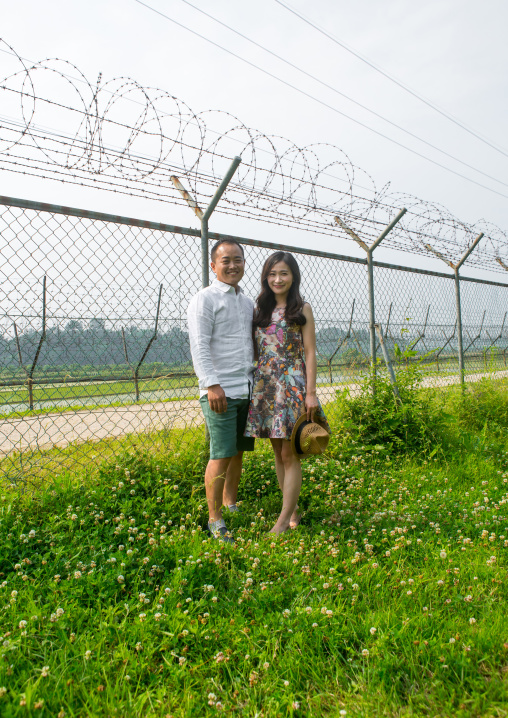 North korean defector joseph park with his south korean fiancee juyeon on the north and south korea border, Sudogwon, Paju, South korea