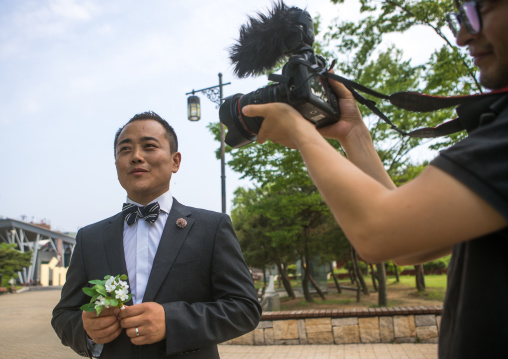 North korean defector joseph park with his south korean fiancee recording a video on the dmz, Sudogwon, Paju, South korea