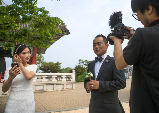 North korean defector joseph park with his south korean fiancee recording a video on the dmz, Sudogwon, Paju, South korea