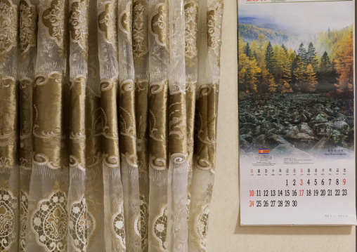 North Korean calendar and curtain during the exhibition Pyongyang sallim at architecture biennale showing a north Korean apartment replica, National Capital Area, Seoul, South Korea