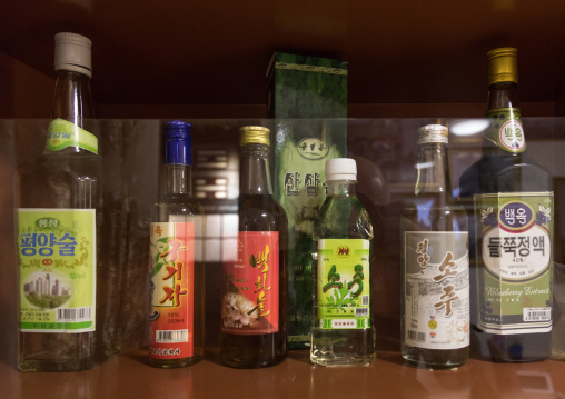 Alcohol bottles during the exhibition Pyongyang sallim at architecture biennale showing a north Korean apartment replica, National Capital Area, Seoul, South Korea