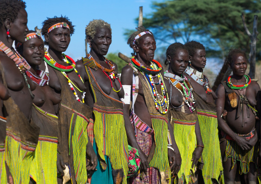 Toposa tribe women in traditional clothing during a ceremony, Namorunyang State, Kapoeta, South Sudan