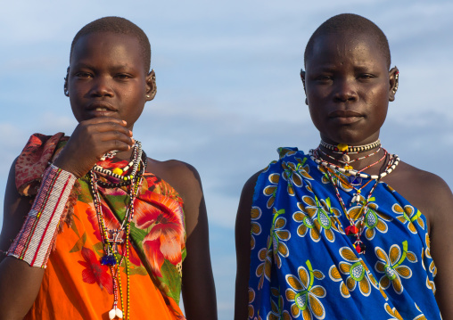 Toposa tribe young women in traditional clothing, Namorunyang State, Kapoeta, South Sudan