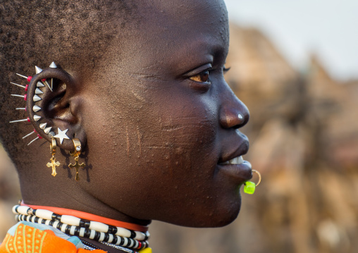 Portrait of a Toposa tribe woman with scarifications on the cheek, Namorunyang State, Kapoeta, South Sudan