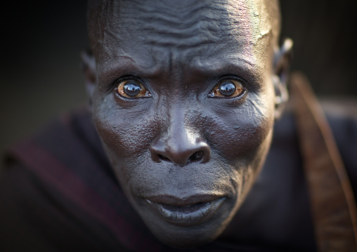 Portrait of a Toposa tribe man with shocked big eyes, Namorunyang State, Kapoeta, South Sudan