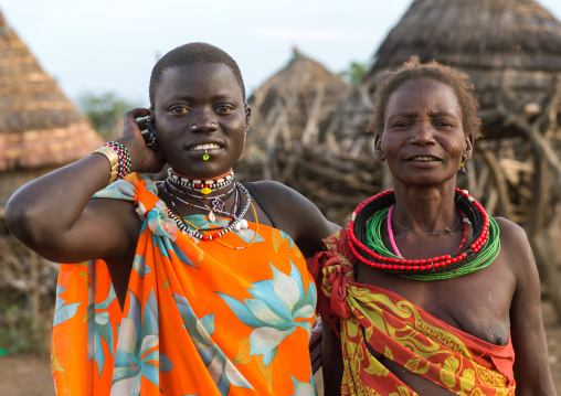 Toposa tribe mother and daughter in traditional clothing, Namorunyang State, Kapoeta, South Sudan