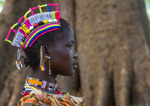 Larim tribe woman with traditional decorations on the head, Boya Mountains, Imatong, South Sudan