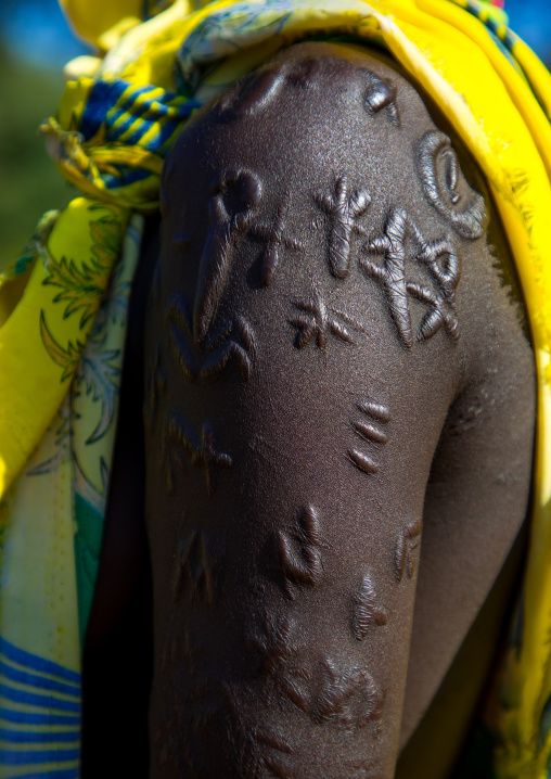 Larim tribe woman with scarifications on her arm, Boya Mountains, Imatong, South Sudan