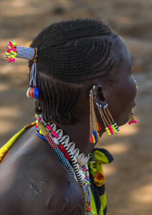 Portrait of a Larim tribe woman with traditional eaerrings, Boya Mountains, Imatong, South Sudan